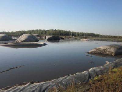 Лагуна в процессе очистки